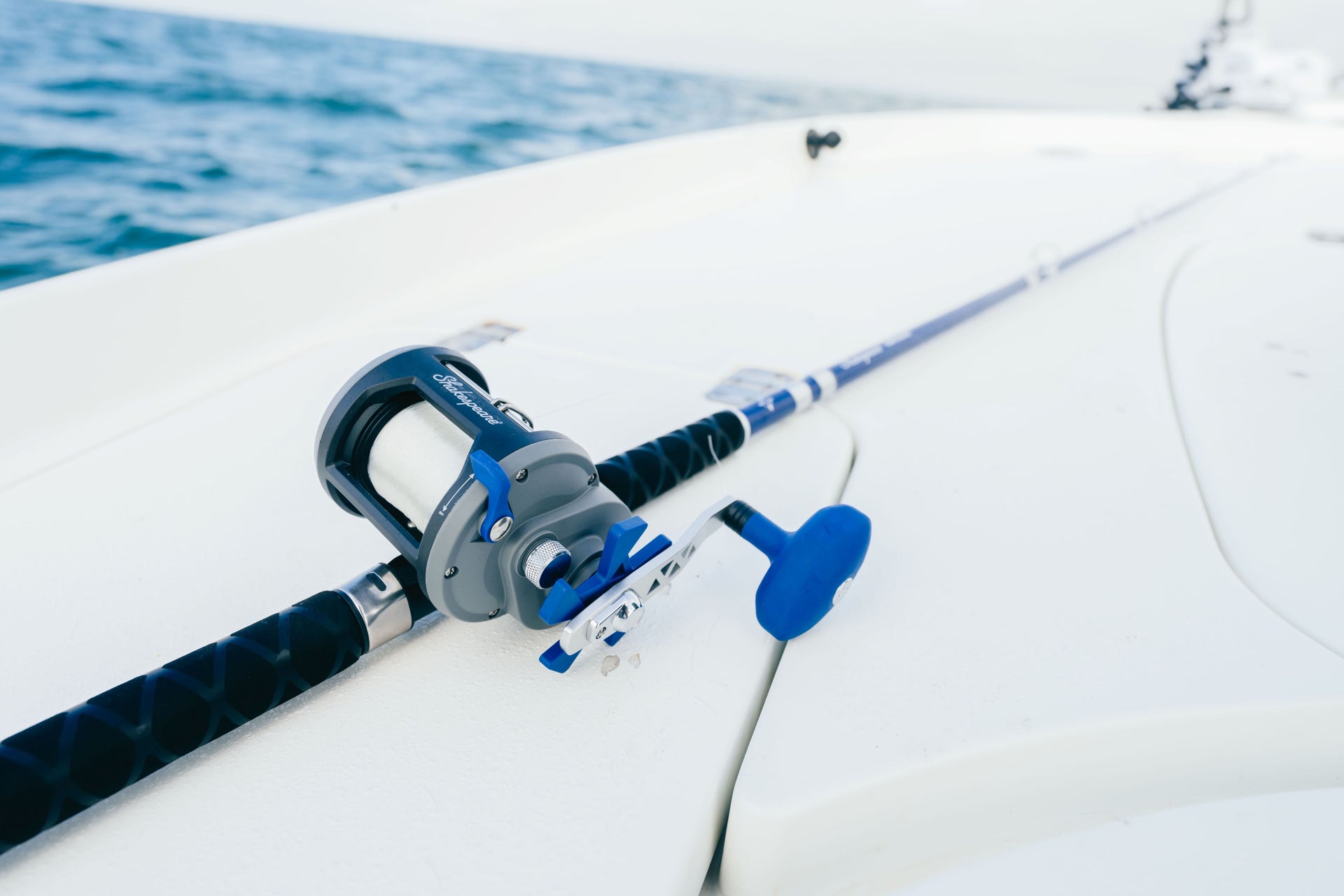 Fishing combo laying on a boat